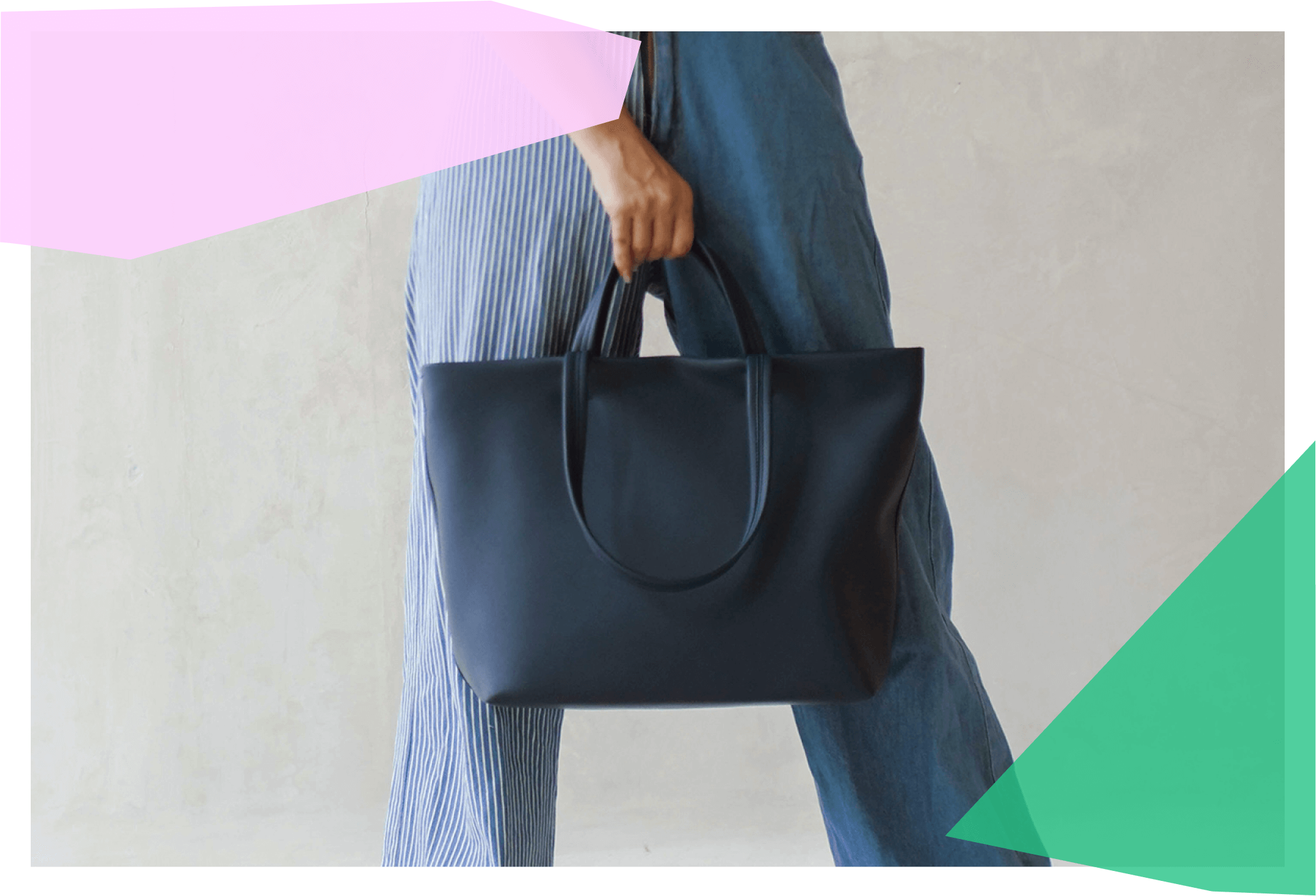 Person carrying a large, navy tote bag 