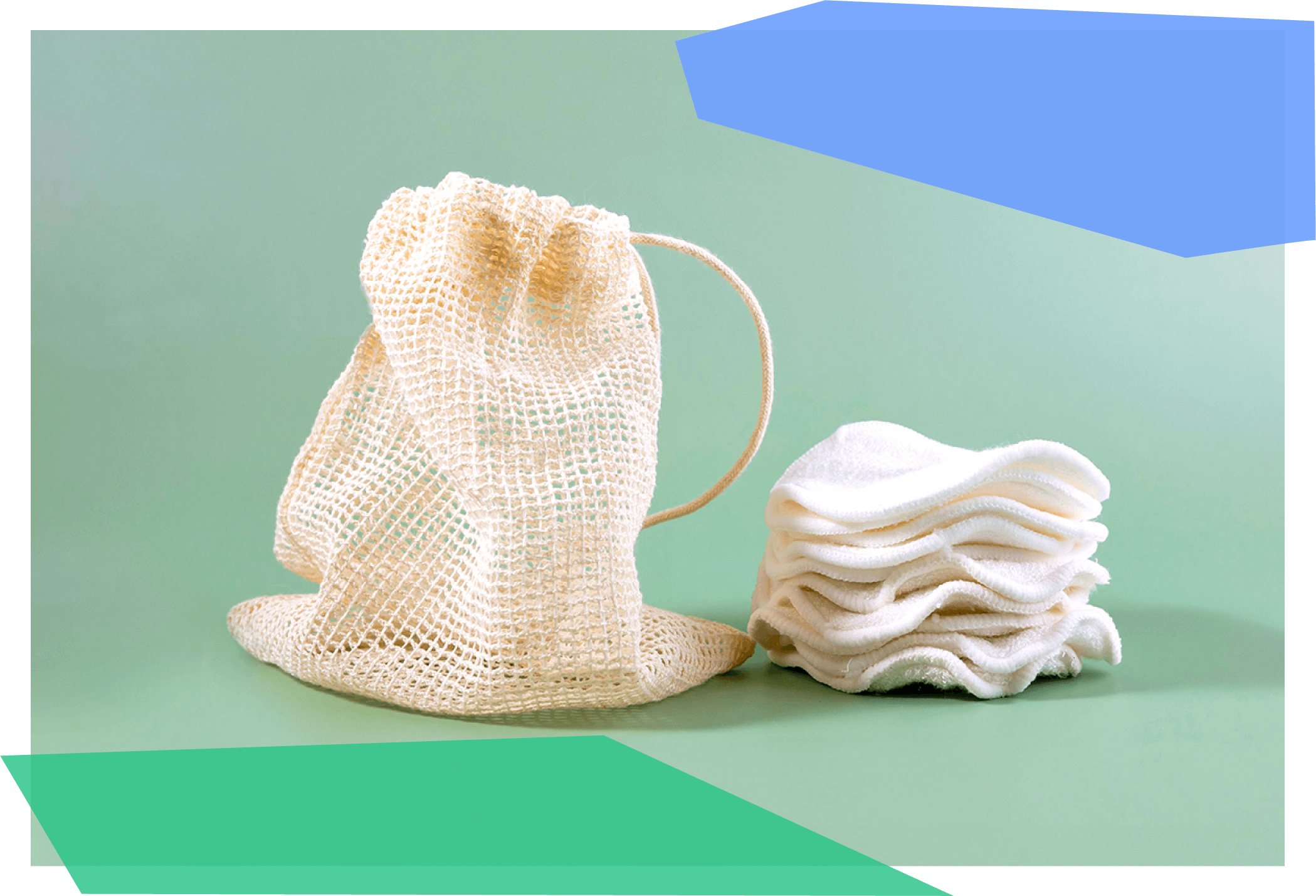 Reusable cotton rounds next to a mesh bag 