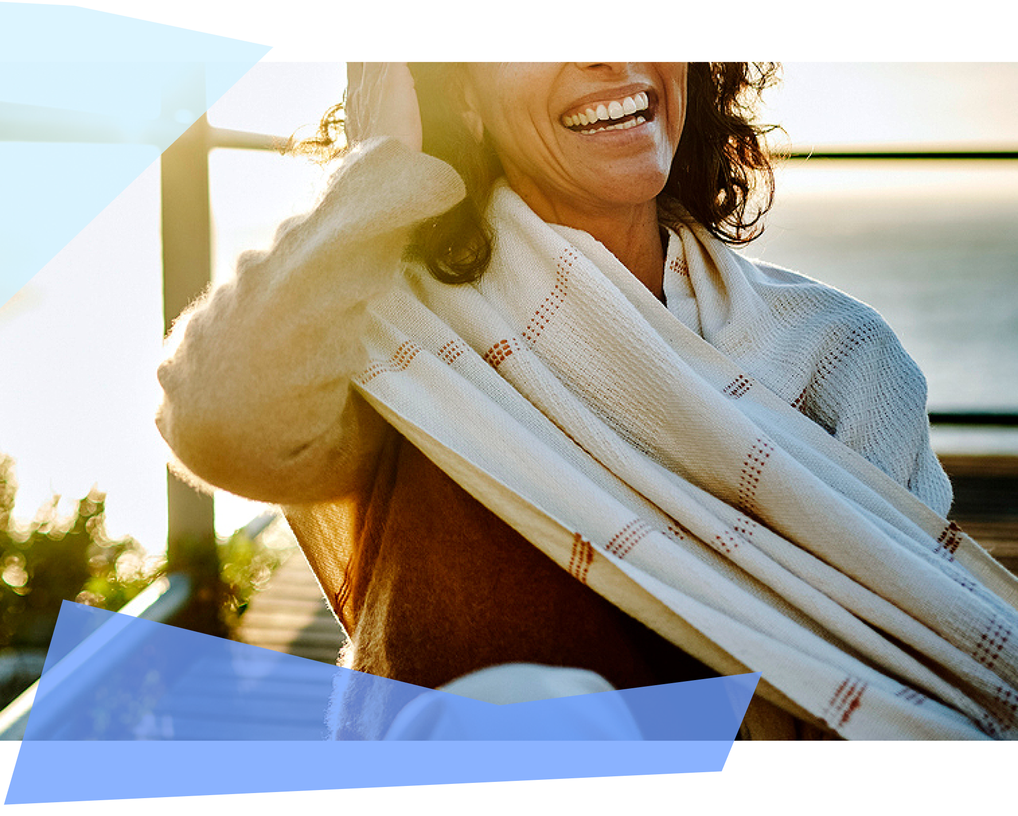 Woman outside laughing. 