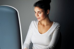 Woman enjoying light therapy during seasonal depression