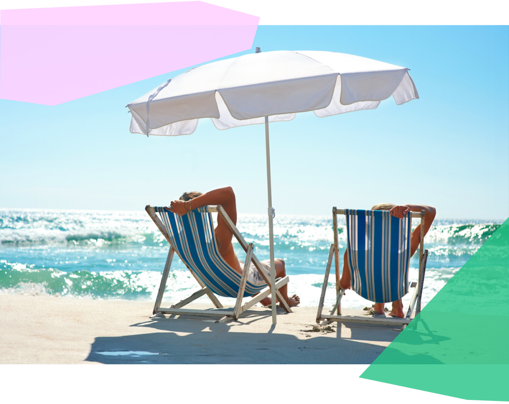 Couple sitting together on the beach 