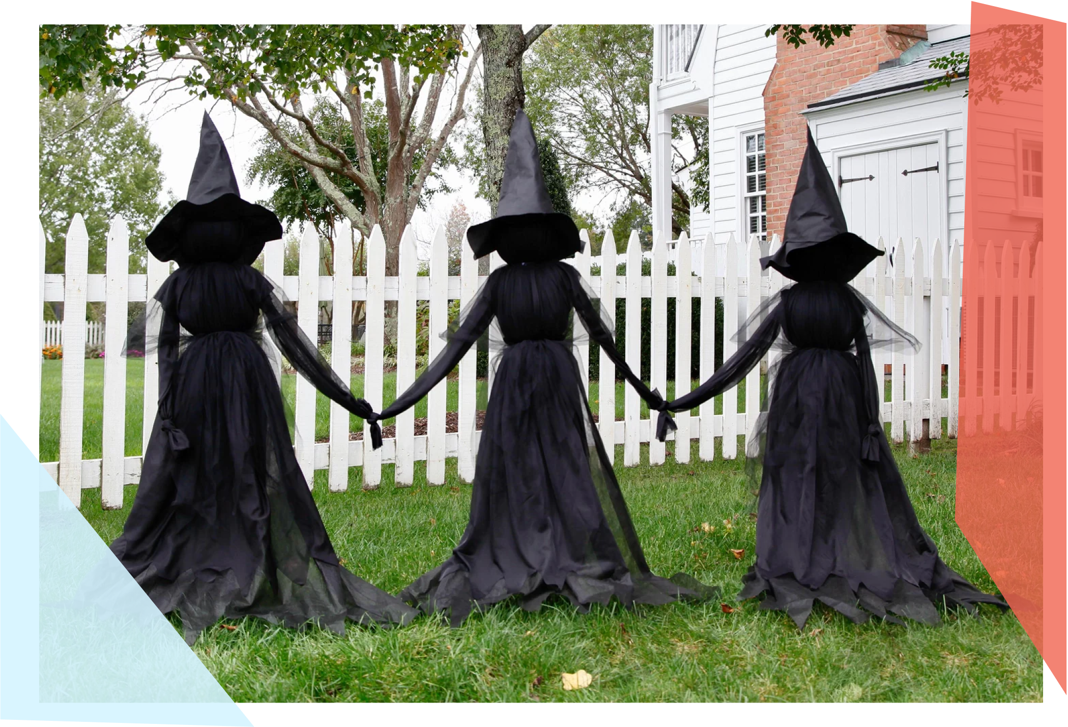 Trio of witches Halloween decor on a lawn