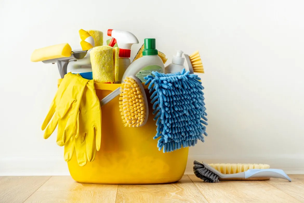 Bucket of cleaning supplies. 