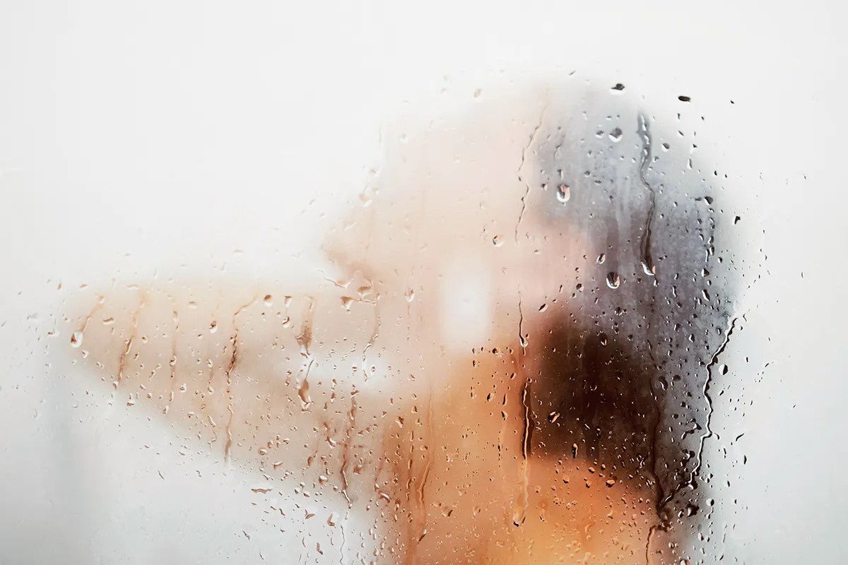 Close-up of the condensation on shower glass 