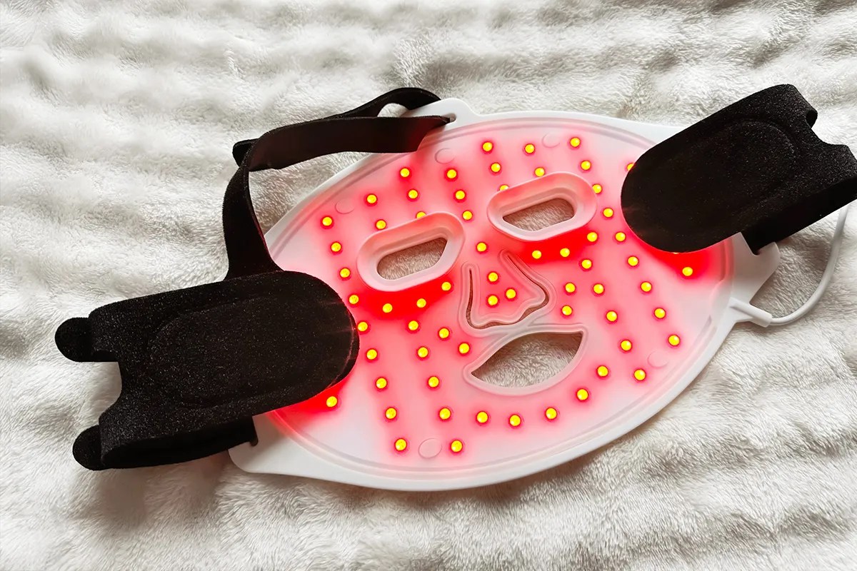 Inside of a red light therapy face mask on soft fabric 