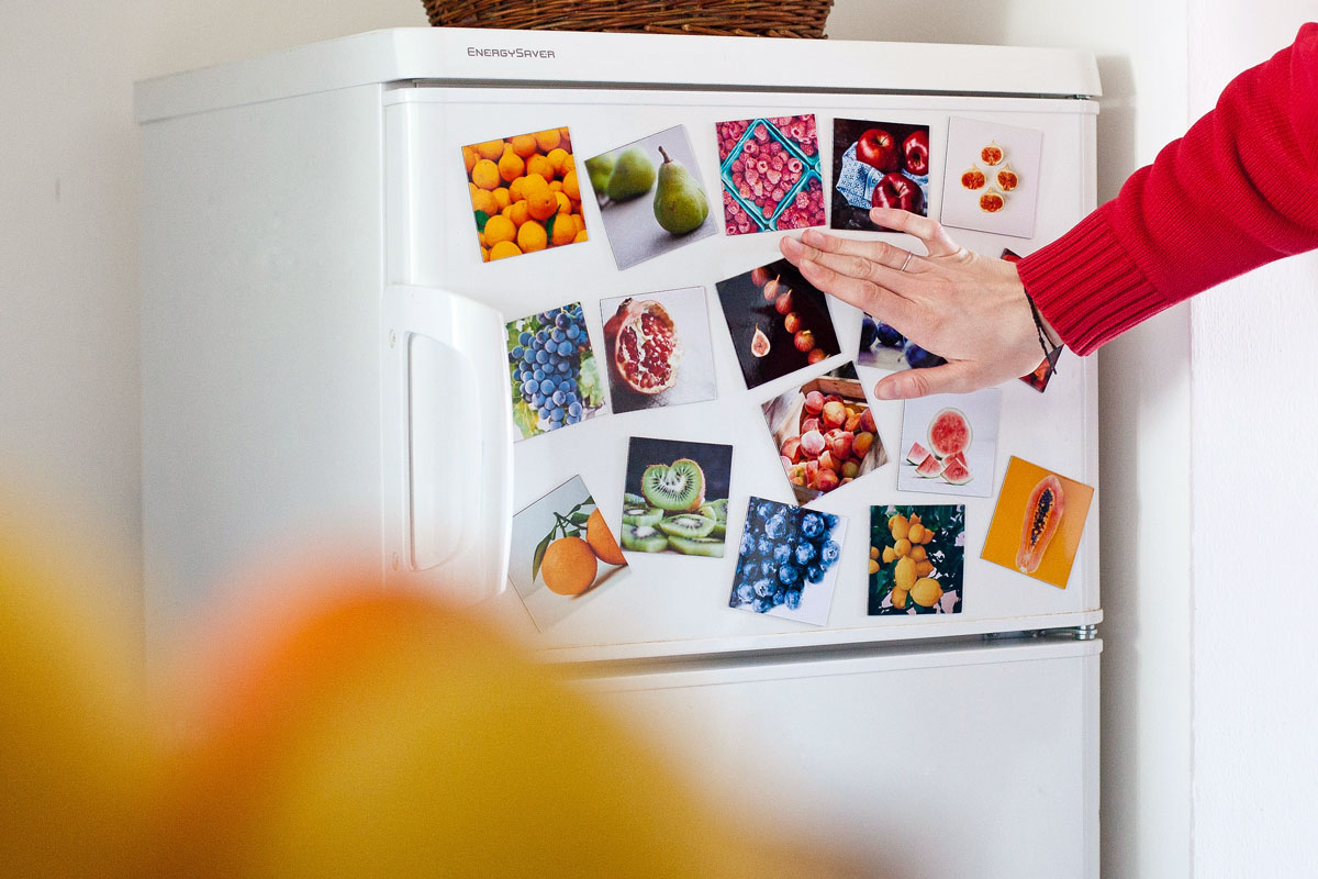 Fridge with magnets all over it 
