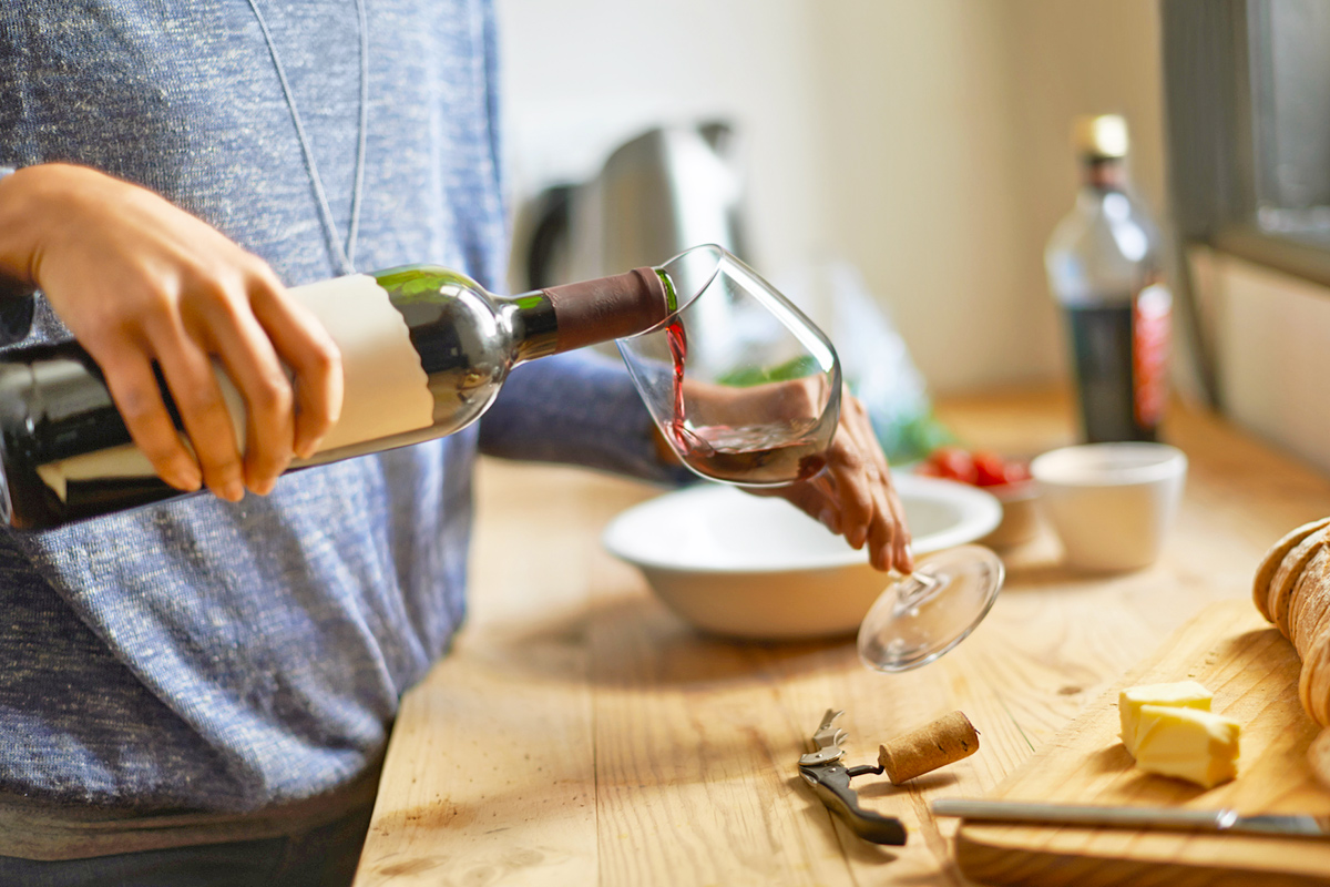 Close-up of pouring a glass of wine 